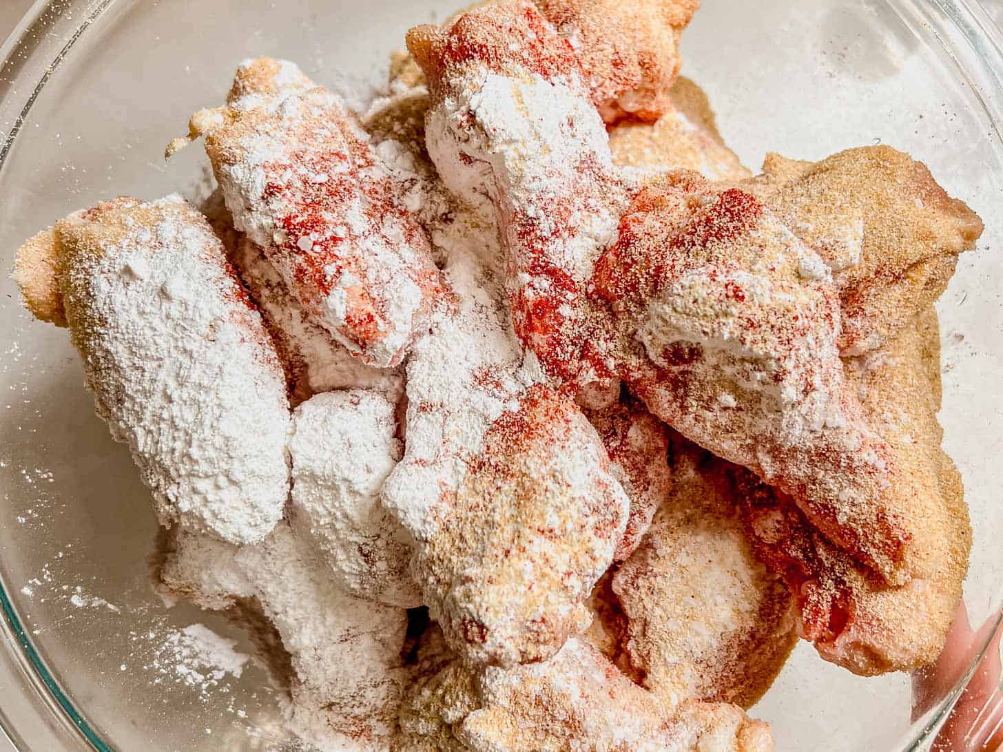 chicken wings tossed with dry rub and baking powder