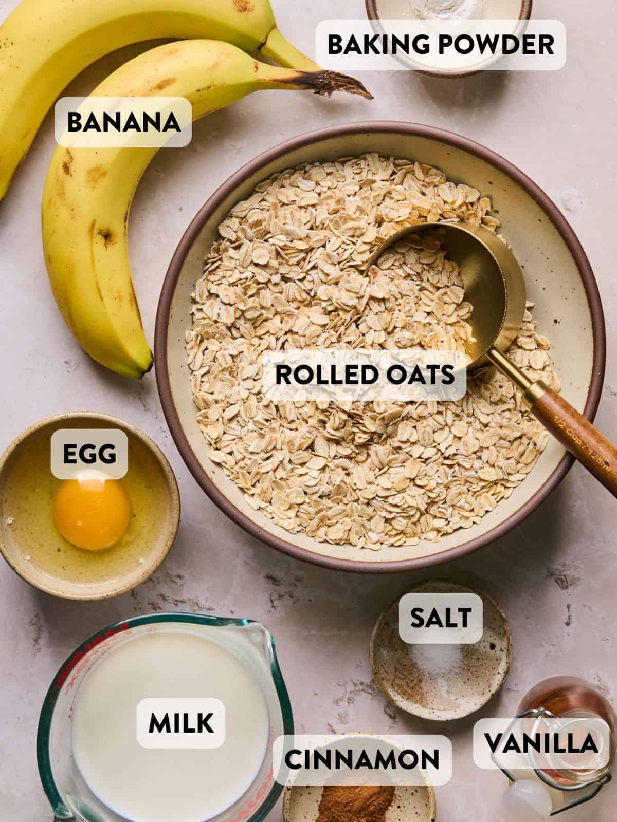 ingredients for banana oat pancakes on a counter.