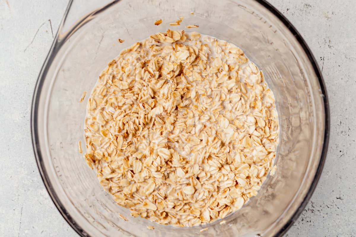 oats and milk soaking in a bowl.